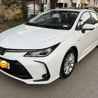 كورولا هايبرد 2025 خليجي رقم بغداد جديد باسمي مكفولة من الصبغ والتبديل...