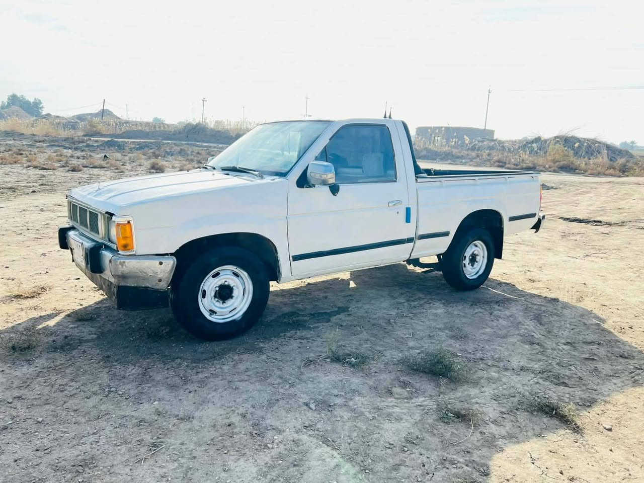 سلام عليكم للبيع نيسان 91 رقم مثنى مشروع وطني شرط تحويل سنويه 2027 كير محرك مكفولات جدد لشرط شاصي مكفول سياره حلوه نضيفه جاهزه مكفوله كفاله عامه من دعمه والكلبه لشرط ماعده رشه صبق حزام جماليه فقط لشرط سياره مالت جناي جاهزه من كلشي ترايك وين ماتريد  سعر 28وبيه مجال *********** مكان سماوه الخضر
