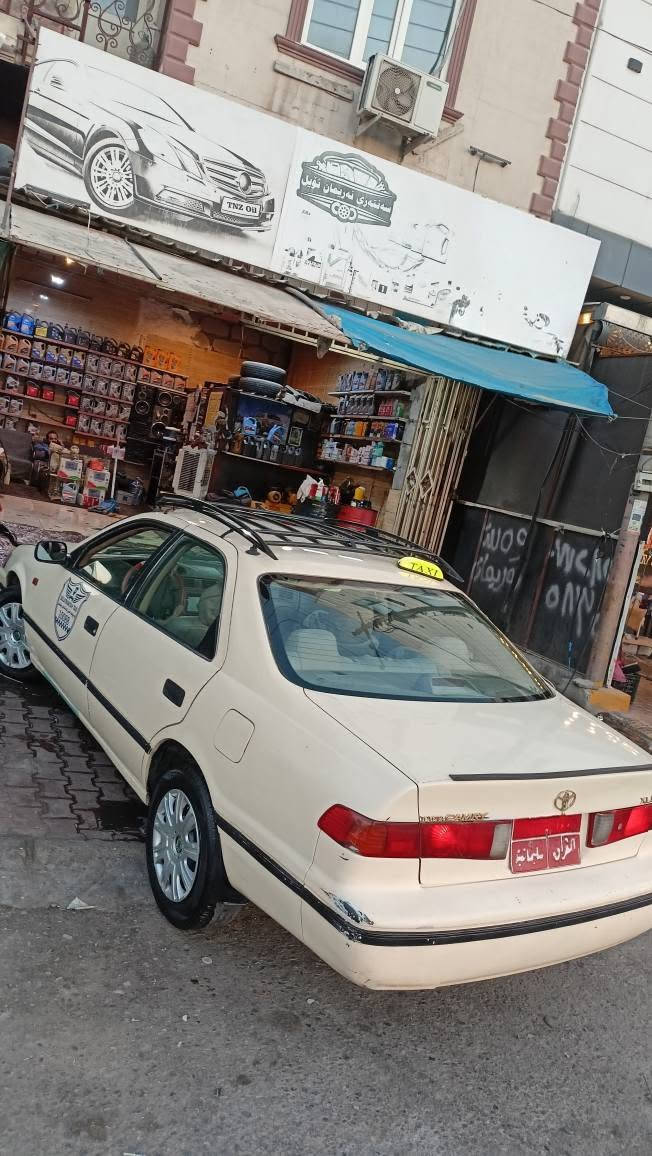 Toyota Camry taxi 🚕 
***********
تۆیۆتا کامری ٢٠٠٢ مەکینە چوار پستۆن کراوە بە غازی قەیوان گێڕ ئۆتۆماتیک تەنها چەمەلەغی سەکنی دەعمە ماڵی دۆستە بێ مەسرف تەبریدی لەسەر سویچ گەرمیو هەموو گیانی ئیش ئەکات مەرجی توندوتۆڵی تازە کراوەتەوە سەیارەکە پاک ماوەتەوە گێڕو مەکینە بەشەرت 
نرخی ٦٥گەڵا و معامەلەیە برایانە 
*********** شربازهير, السليمانية
