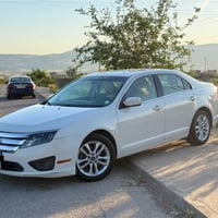 Ford fusion 2011 se  گێڕ و مەکینە بە شەرت  کلین تایتڵە قەترە بۆیاخی نی...