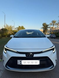 كورلا 2025 هايبرد ماشية 10 الاف  كفالة عامة من الصبغ والبارد  بيها رصع...