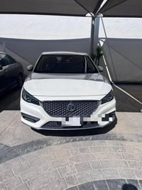 سيارة mg6 موديل 2021 ماشية 65 الف فول مواصفات بصمة سلايد  اشاير بالمري...