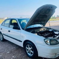 اكسنت • ٢٠٠٣ • جير عادي