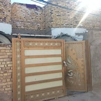 الديوانية شارع الاسكان • ١٢٥م • ٤ غرف