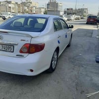 كورلا موديل 2009 بغداد رقم انكليزي مصبوغه حزام بسبب طخطخات خارجيه  بدو...