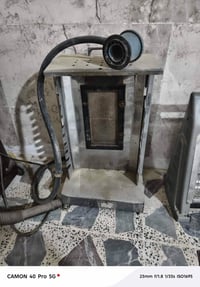 قنينة غاز • مكنسة كهربائية