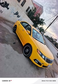 كيا أوبتما أمريكي تبديل بنيد بدون دواخل موديل 2010 بسمنه مصفره هيئه وخ...