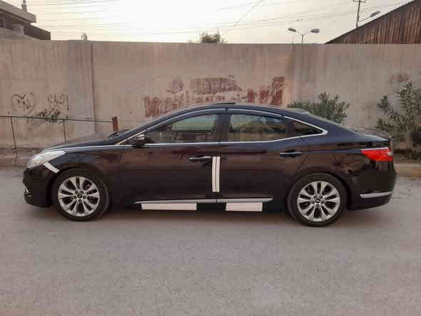 للبيع ازيرا 2012خليجي
كفاله عامه من الصبغ والبارد 
لون جوزي
كل التفاصيل مذكوره بالمنشور
_______________________
موصفات السياره فول موصفات vip
1/بصمة تشغيل +ابواب +صندوك 
2/بنورامه 
3/حساسات امامي +خلفي 
4/زراكات لايت 
5/داخل قرميدي جلد
6/داخل كله لدات 
7/كيجات اكتروني 
8/ كشنات كهرباء كل الوضعيات 
9/بردات ابواب +الخلفيه كهرباء 
10لايت كهرباء يصعد وينزل 
11/لايتات وبك لايت لد نهاري وليلي 
بيه هواي موصفات 
.............................................
السياره عليه ادامه كامله تخم تاير 
صدر امامي خلفي +دبلات كله جديد 
دسكات جدد 
بلكات +مجاول +فيت بم ولعبوه مالته كله جديد 
مبيه نقص بكد البرغي خير من الله 

_______
هونداي أزيرا 2012 فول مواصفات 
محرك v6 3000 
_______________________________

كلشي مذكور بالمنشور  بأدق التفاصيل
_______________________________

كير و محرك مكفولات كفاله عامه  لا صوت رواجز ولا شي 
_______________________________
رقم بغداد رقم وسنوية كله جديد 2029 شرط التحويل مباشر 
_______________________________
سعر السيارة : 135وبيه مجال  ورقة وبيها مجال جدا بسيط
_______________________________
مكان السيارة : بغداد الكرخ
_______________________________
للأستفسار : 

*********** متوفر واتساب/وتصال بغداد
