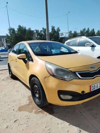 كيا ريو • ٢٠١٤ • مكينه وكير جدد