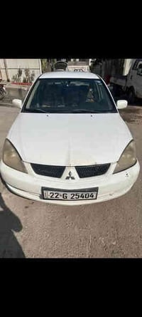من رخصة السيد مدير الكروب المحترام سيارة للبيع مسيبوشي موديل 2010السيا...