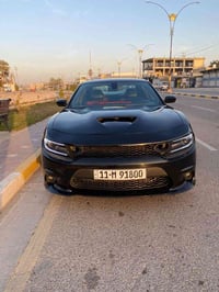 جارجر 2018رقم بغداد الجديد SRTمحرك     6200    بيها 3قطعً صبغ حادثها ج...