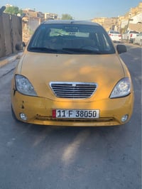 طيبة 2015 للبيع  رقم بغداد دولي  سيارة بسمي سنوية هزة جديدة  مصفرة هيئ...