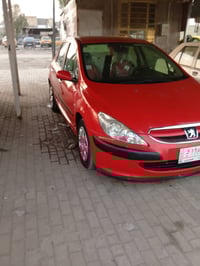 بيجو 2005 بيه مكانات صبغ مكفولة من الظربه كير مكينه صدر تخم تاير  كهرب...