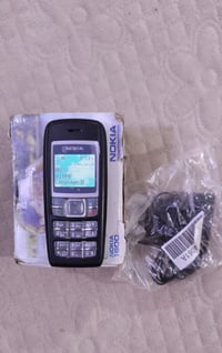 نوكيا 1600 • غير مستخدم • ملحقات كاملة
