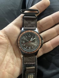 ساعة • سير نسيج أصلي • مقاوم للماء