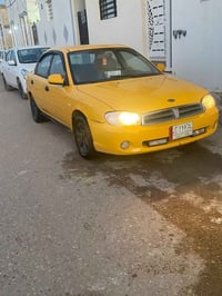 اسبكترا • ٢٠٠١ • نجف حي ميسان