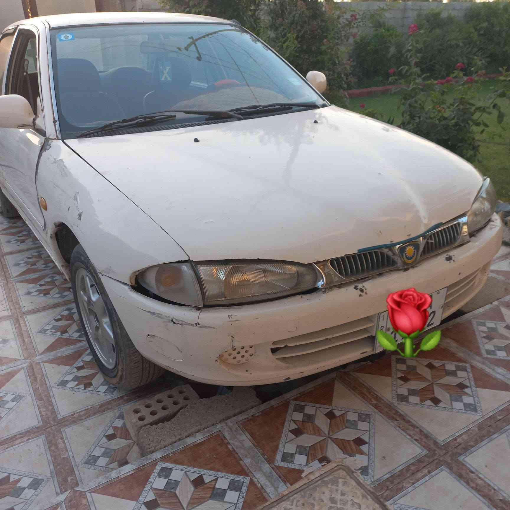 السلام عليكم بروتون اللبيع  موديل 2000 واسط لون ابيض تنقيص فقط حداديه جديده ***********
