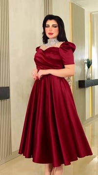 مقاس ٤٨ • أحمر • زيتوني