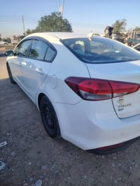 فورتي لون ابيض  / 18رقم بغداد نكليزي تعمير ربع بنيد جاملغ مامي تعمير م...