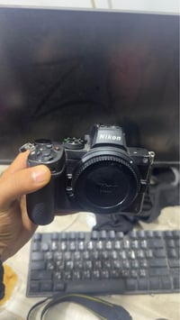 كامرة نيكون z5  للبيع فقط بدي   للاستفسار ٠٧٧٢٨٤٦٣٢٣٤ فقط وتساب Singap...