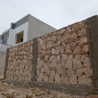 أعمال الحجر • بيوت حجر • أسوار