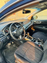 نیسان سێنترا مۆدێل ٢٠١٨ SV ئەمریکی ١٤٥،٠٠٠k/m ڕۆیشتوە گئر و مەکینەی بە...