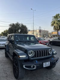 Jeep WRANGLER SAHARA 4Xe 2024  فول مواصفات بلكن هايبرد  حادثها حداديه ...