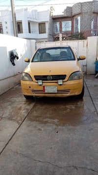 سياره افيو كير اوتو   موديل ٢٠٠٣ رقم بغداد السعر 20وبيهه مجال لاتصال ع...