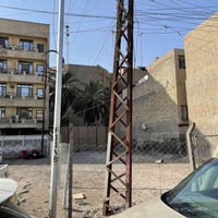 ارض مساحة ٣٠٠ متر مكان كرادة قريب ساحة الفردوس خلف مستشفى الفردوس  للع...