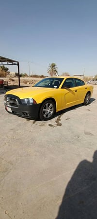 شارجر 2013 مكفولة كفاله عامه رقم بغداد باسمي مداور ثاني يوم سياره جاهز...