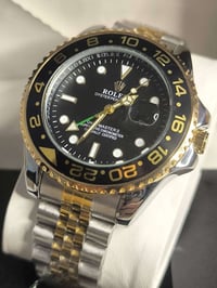 ساعة GMT • مكينة كوارتز • ستانلس ستيل