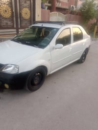 سياره رينو لوجان للبيع بسمي رقم بغداد انكليزي مشروع وطني كير محرك صدرا...