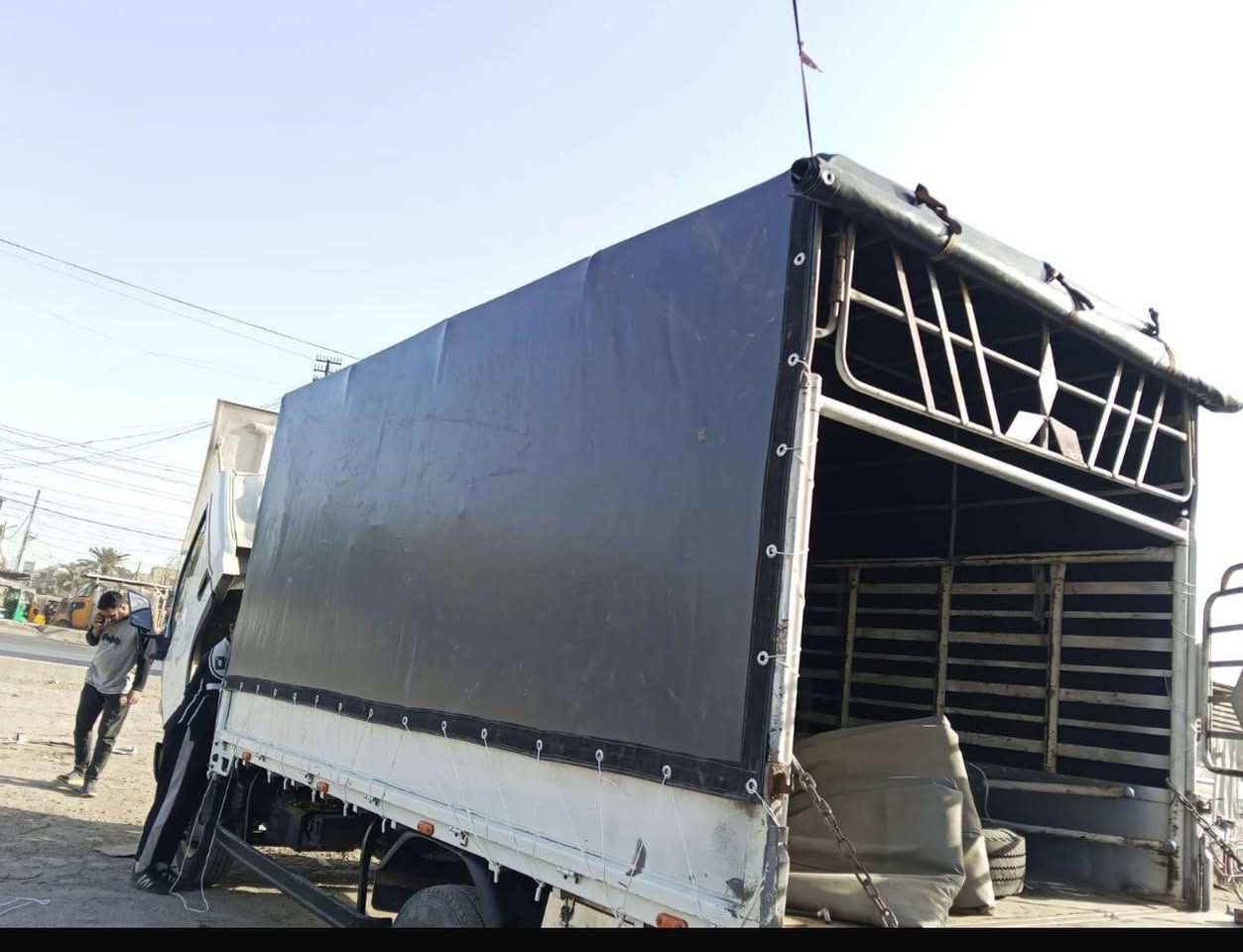 عمل چوادر سيارات الحمل العنوان بغداد ***********
