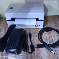 طابعة حرارية • تشتغل على كهرباء • تسحب جميع الورق