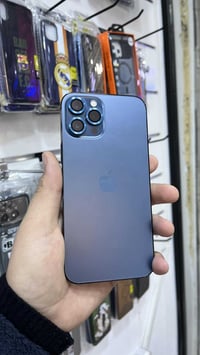 ايفون 12برو ماكس ذاكرة 512 جهاز بلادي شرط ما داخل صيانه فقط بطاريه مصع...