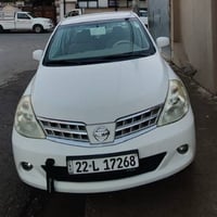 نیسان تێدا 2010 گێر ئۆتۆماتیک  سێ شوێنی بچووکی ساردە کوتی هەیە  بێ بۆی...