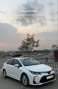 للبيع كورلا هايبرد 2024 ماشيه 26 Km كفاله من الصبغ والبارد بغداد البلد...