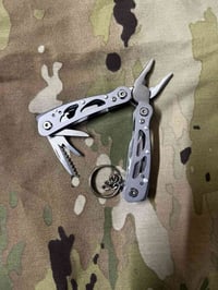 كيربر • تيتانيوم • متعدد الوظائف