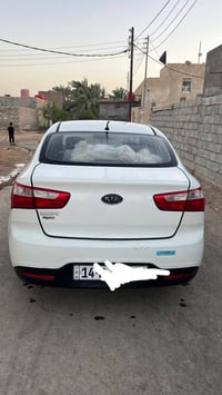 كيا ريو مديل 2014 بسمي بيه بكانات بارد وشبر صبق بلباب سعر 90 رقم 07801...