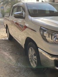 تويوتا هايلوكس للبيع  الموديل ٢٠٢٥  رقم بغداد الدولي  مواصفات SR  فول ...