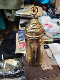 دلة نحاس • حقيبة جلد • مستعجل