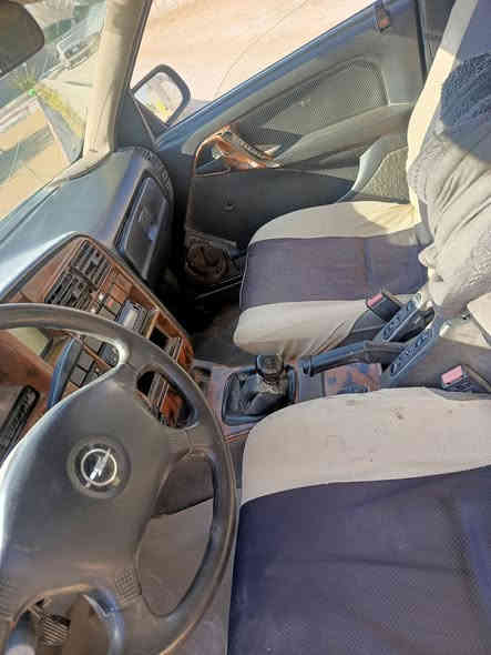 السلام عليكم وبل 92رقم بغداد اسود كامل كمرك وهزه وفحص  بدون راعي محرك جديد كير صدر جديد ولباقي كدامك ***********السعر 13 وبيها مجال شويه مكان عامريه الفلوجه
