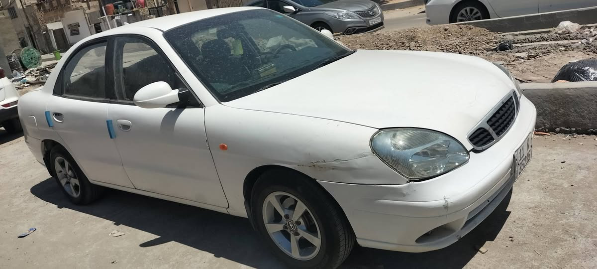 نوبرا 2 موديل 2001 بأسمي محرك جديد مفتوح كهربائيات كله شغاله كيجات واضويه صدر كلش نظيف دواخل بلاديه نظيف بدون ضربه ولا تبديل مصبوغه عام جماليه تخم تايرات رقم انكليزي جاهزه من كلشي نقصه الكير اوتو عاطل تمشي بس على البك ماعندي مجال اوديهه للتصليح ابيع على عطله السعر 26 وبيه مجال للطيبين للأتصال *********** مكان السياره بغداد مدينة الصدر
