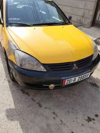 اخوتي الطيبين لانسر مديل 10 سياره بيهة طخة مثل ما موضح بل صوره و بيهة ...