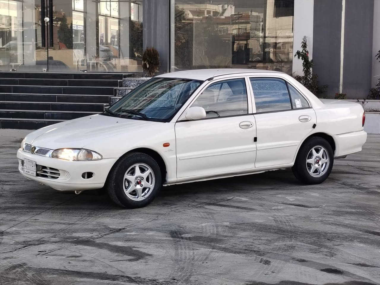 السعر 53$$           ***********
بروتون موديل 2005 مكينه كير شرط تبريد شغال توماتيك جامات كهرب صبغ جاملغ خلفي رقم نينوى ألماني مشروع وطني شرعي موجود شرط التحويل
