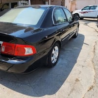 كيا اوبتما ٢٠٠٦ محرك الفين باسمي تبريد ثلج منظومه كامله جديده محرك جدي...