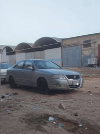 نيسان صني 2008 مراوس بلون ابيض مكفولة من الضربه بيه فقط بارد رقم 07808...