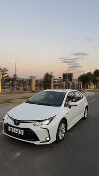 للبيع كورلا هايبرد 2024 رقم بغداد انكليزي تحويل مباشر ماشيه: KM21الف م...