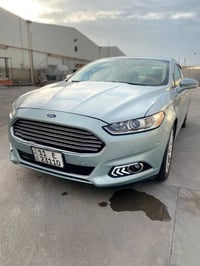 {بسم الله الرحمن الرحيم} فورد فيوجن هايبرد se 2.0L  موديل 2013 (معلايه...
