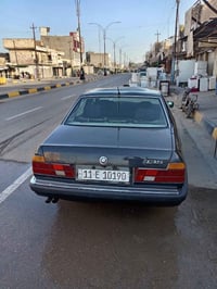 بي ام 735 • قير ومحرك جديد • رقم بغداد